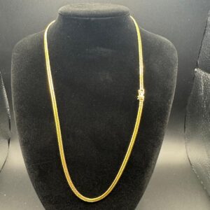 Cadena Tipo Curb Plana en Oro 18K — 20”